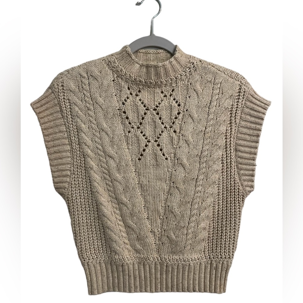 Knitted Beige Neutral Sleeveless sweater.